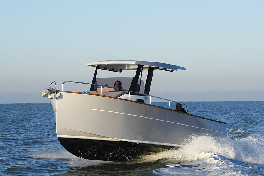 rhea boat at full speed on blue ocean